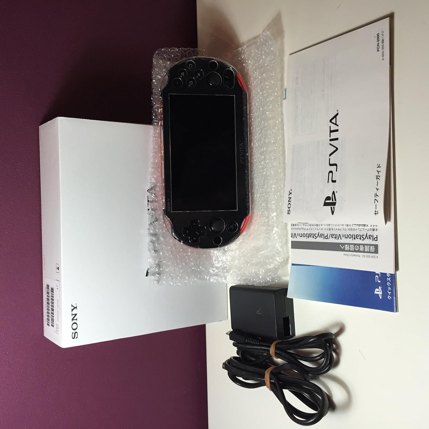 PlayStation Vita Wi-Fi model Red / Black C34220